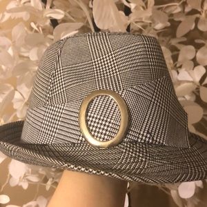 A gray, black, and white hat.